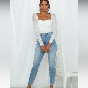 Hello Molly white bodysuit. Never been worn. Size small.